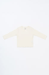 Avauma Chloe Ribbon T-shirt in Cotton Cream, a ribbed long-sleeve baby top with a sweet ribbon detail.